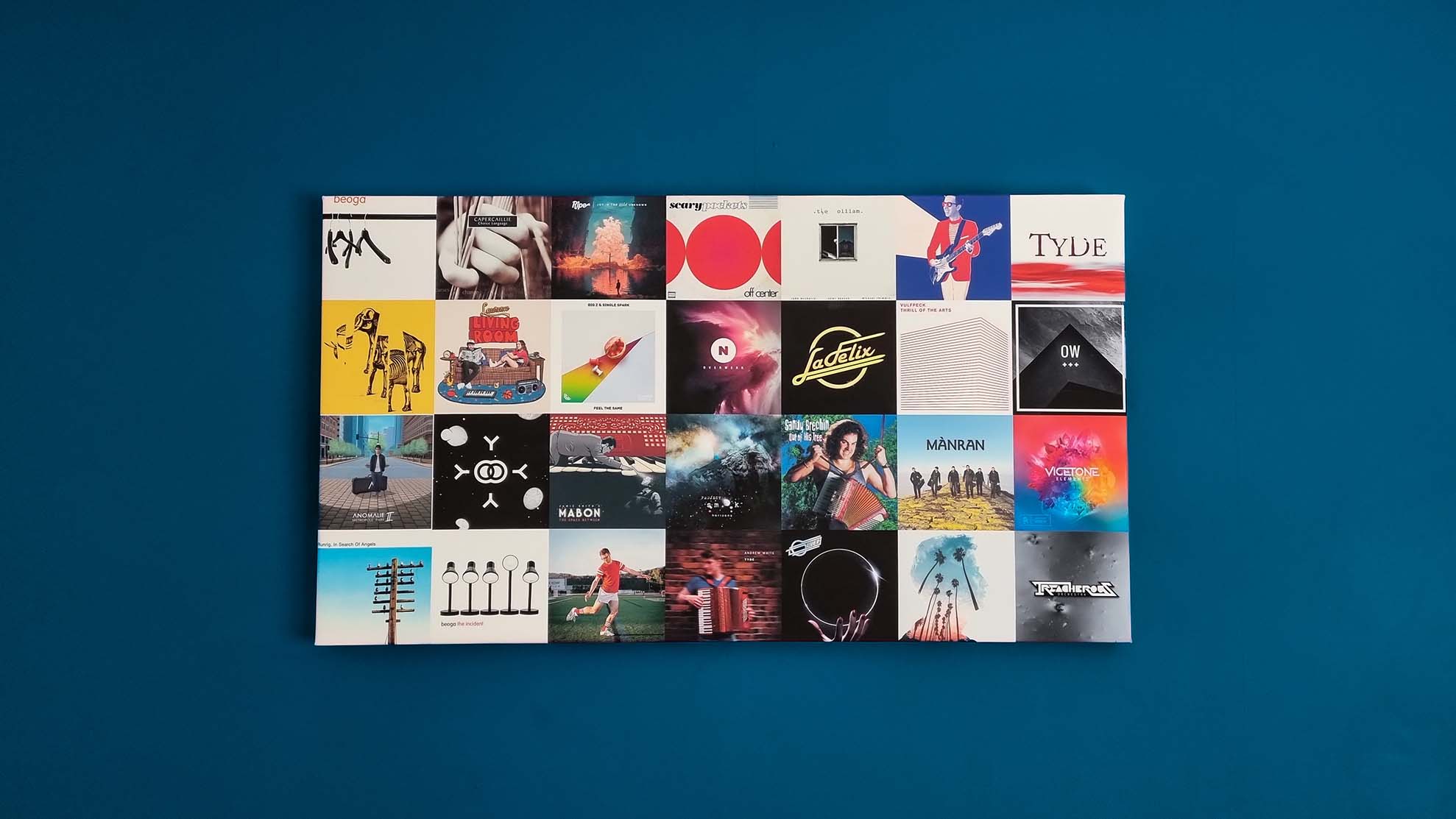 Music Album Canvas art on a navy blue wall